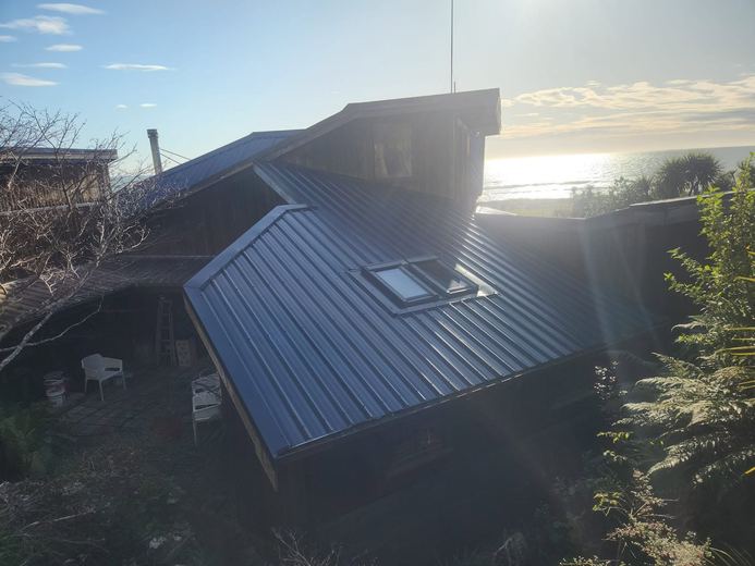 New roof with skylight, looking out to the sea